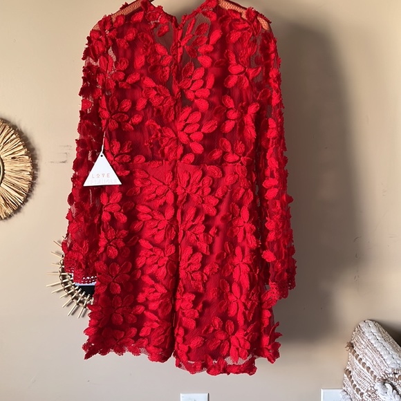 Red Appliqué mini dress. New with tags, see thru back and see thru low in front - Picture 2 of 4